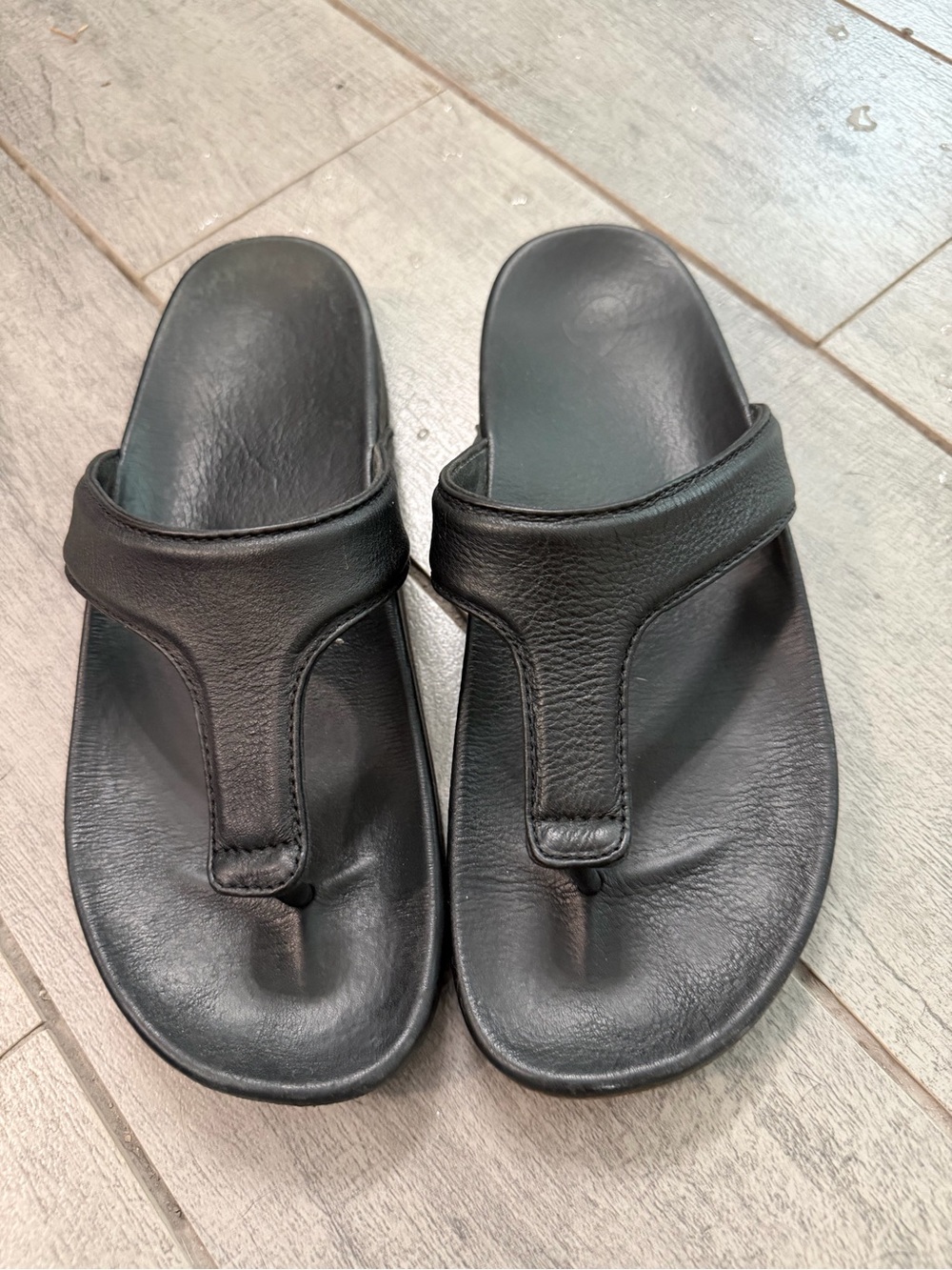 OluKai KIPE'A LIPI Women’s Black Leather Sandals